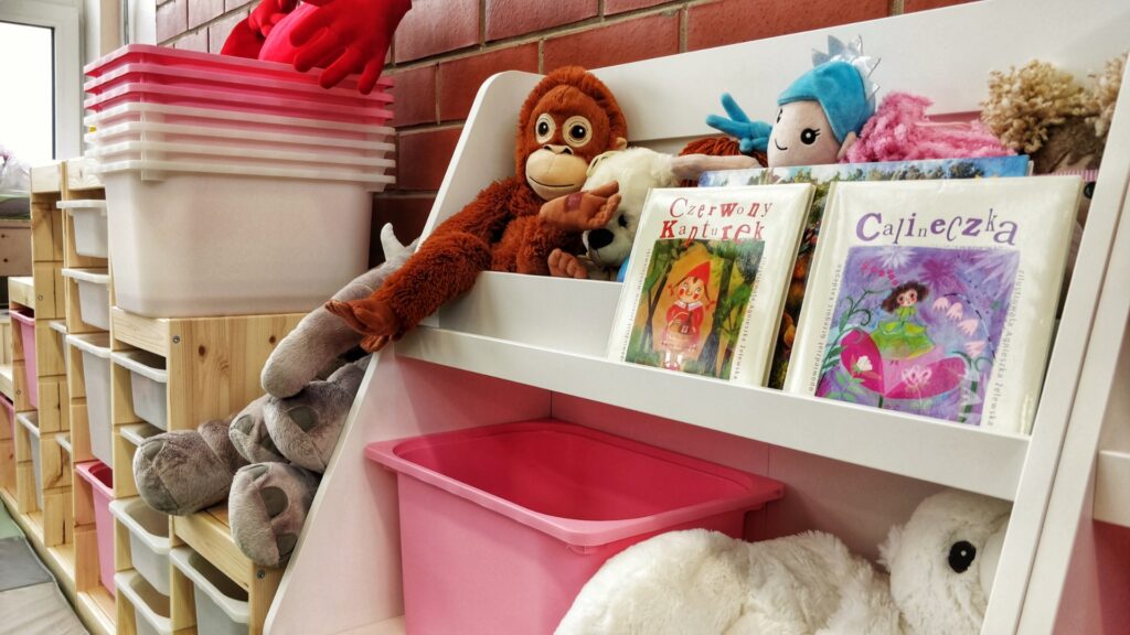 Kids books on a bookshelf in a pop-up daycare in a refugee centre in Zamość
